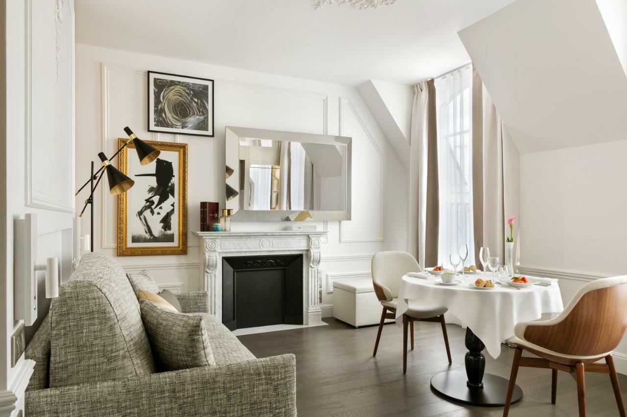 라 클레 샹젤리제 파리 바이 더 크레스트 컬렉션 외부 사진 A living room in Paris